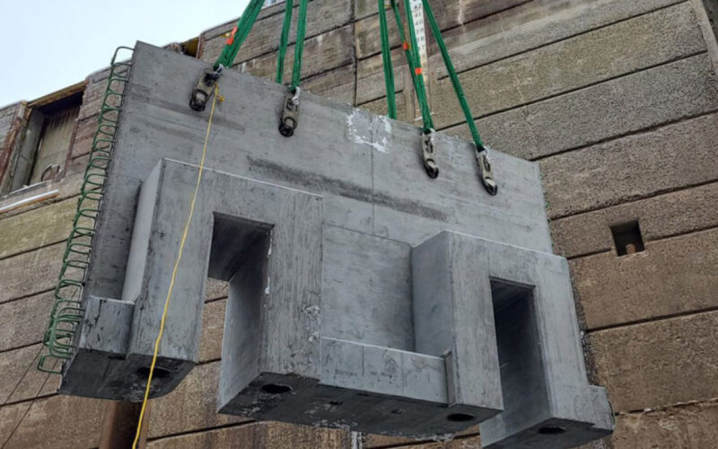 precast hanging from crane at Snell Lock