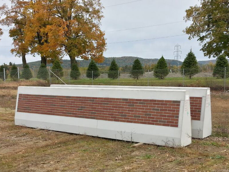 pair of highway barriers on ground