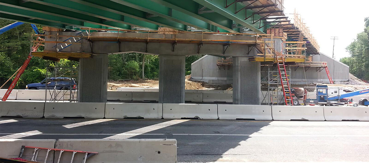 bridge under construction over highway