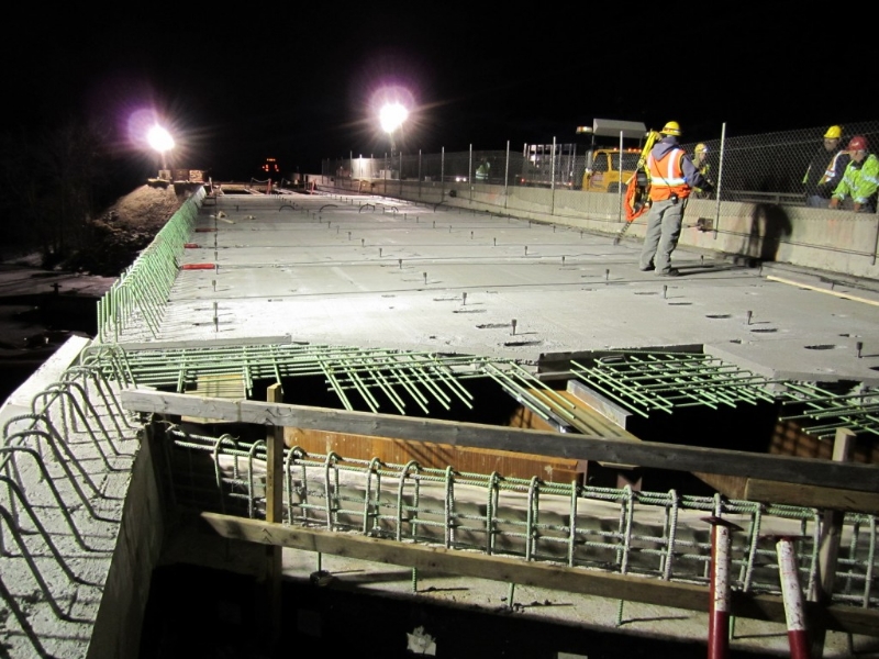 Precast Deck Panels used in construction at night