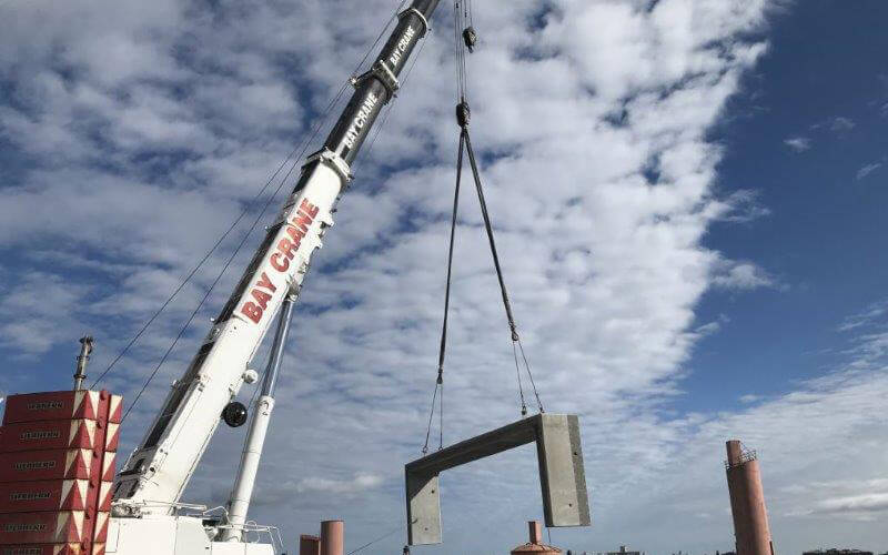 construction crane with blue sky in background