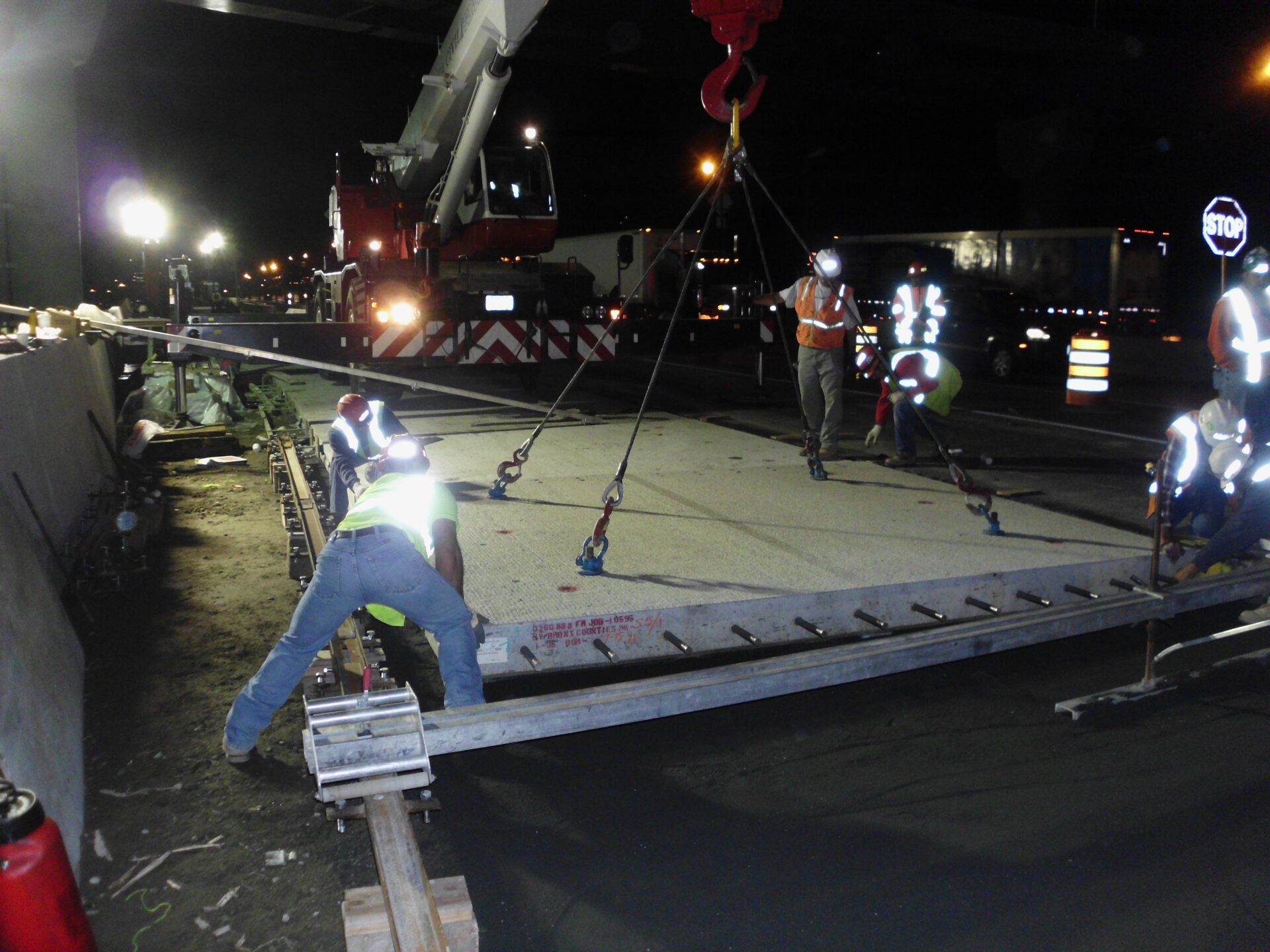 Overnight installation of precast concrete pavement panels
