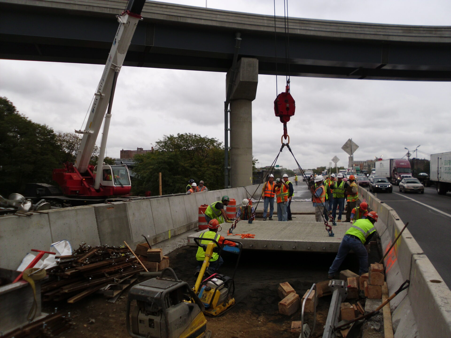 Overnight installation of precast concrete pavement panels