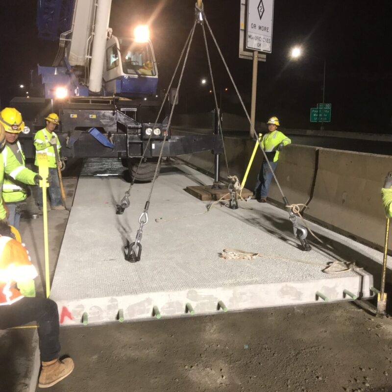 Installing Super-Slab precast pavement panels during overnight closure of H-1